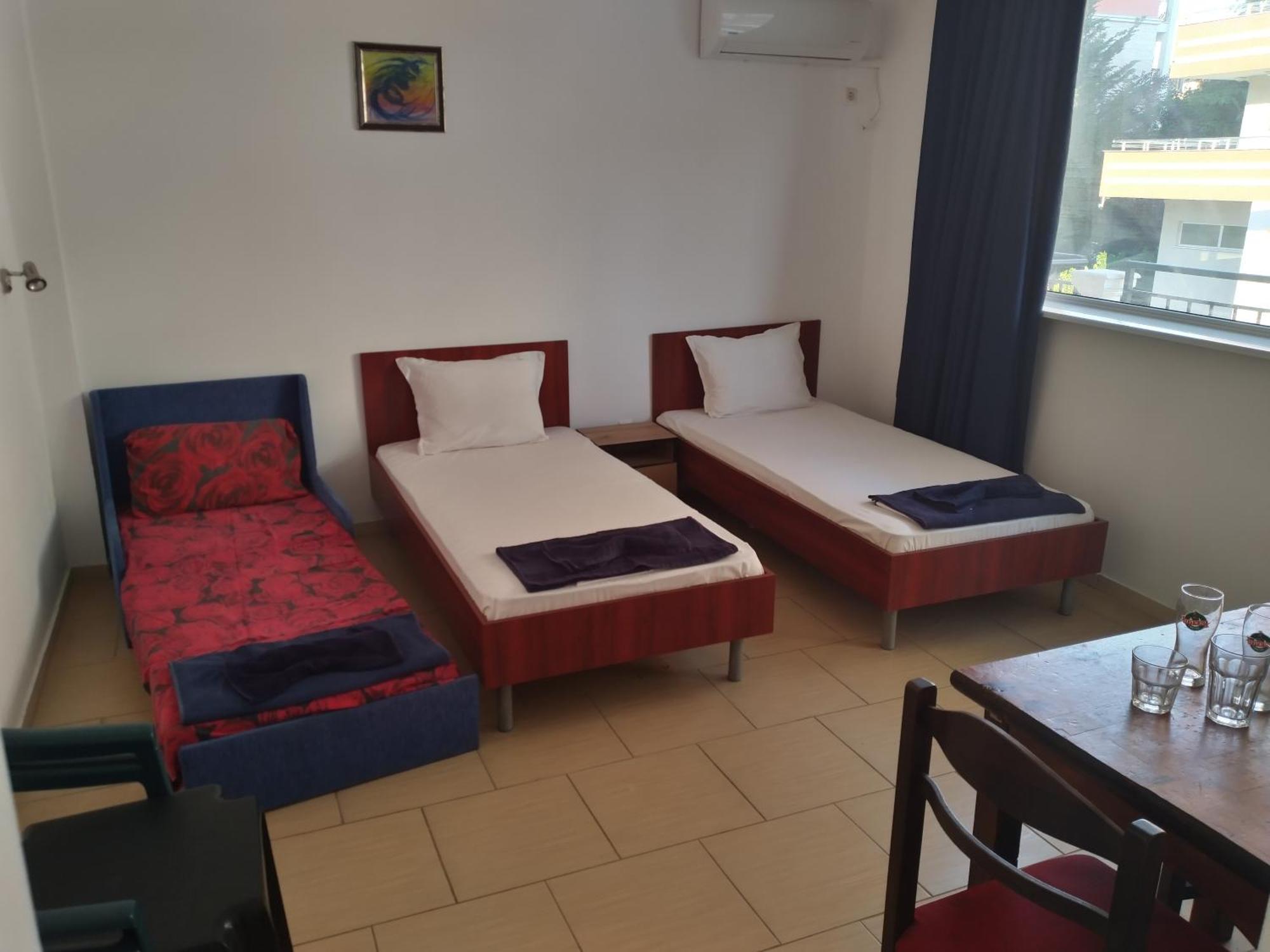 Chambre Triple avec Terrasse
